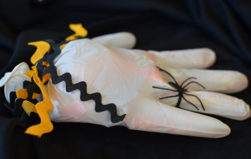 A DIY IDEA FOR SPECIAL HALLOWEEN TREATS | Scary Gloved Hand Full of Halloween Candy | www.AfterOrangeCounty.com