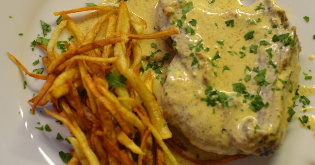 PAN FRIED PORK CHOPS WITH MUSTARD CREAM SAUCE